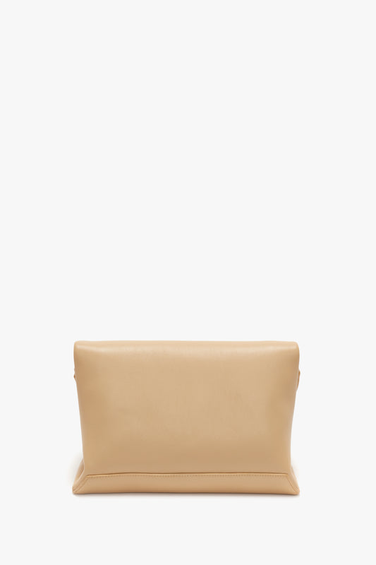 Chain Pouch With Strap In Sesame Leather crossbody bag by Victoria Beckham on a white background.