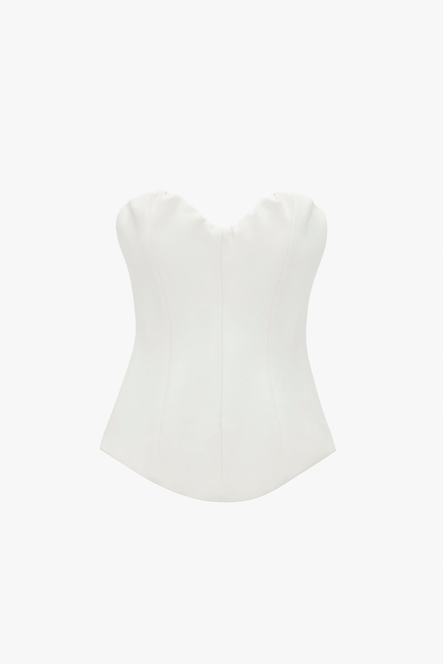 White strapless Corset Top In Antique White with a sweetheart neckline on a white background by Victoria Beckham.
