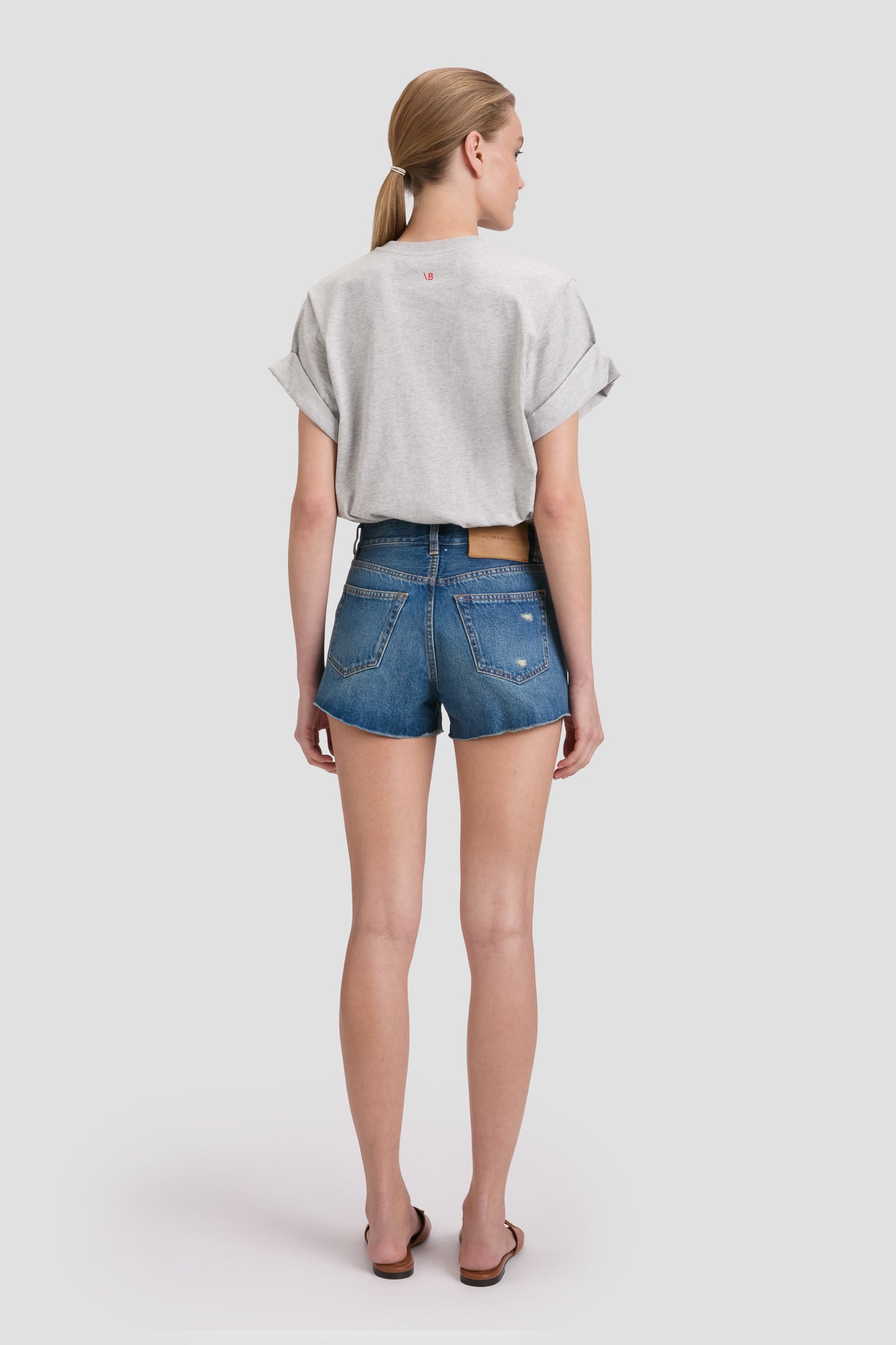 Distressed Shorts In Mid Blue Wash