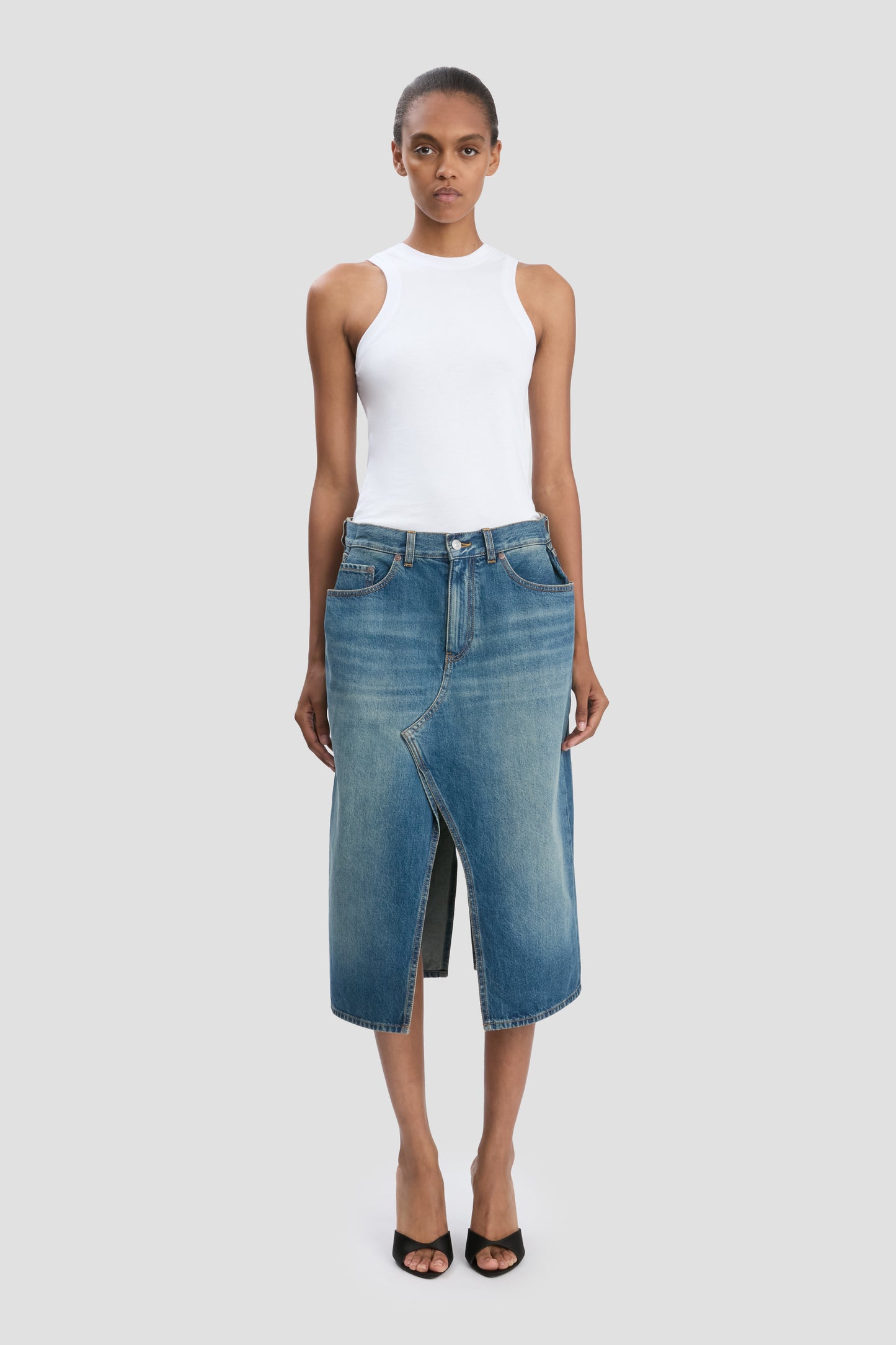 Kick Pocket Denim Skirt In Mid Blue Wash