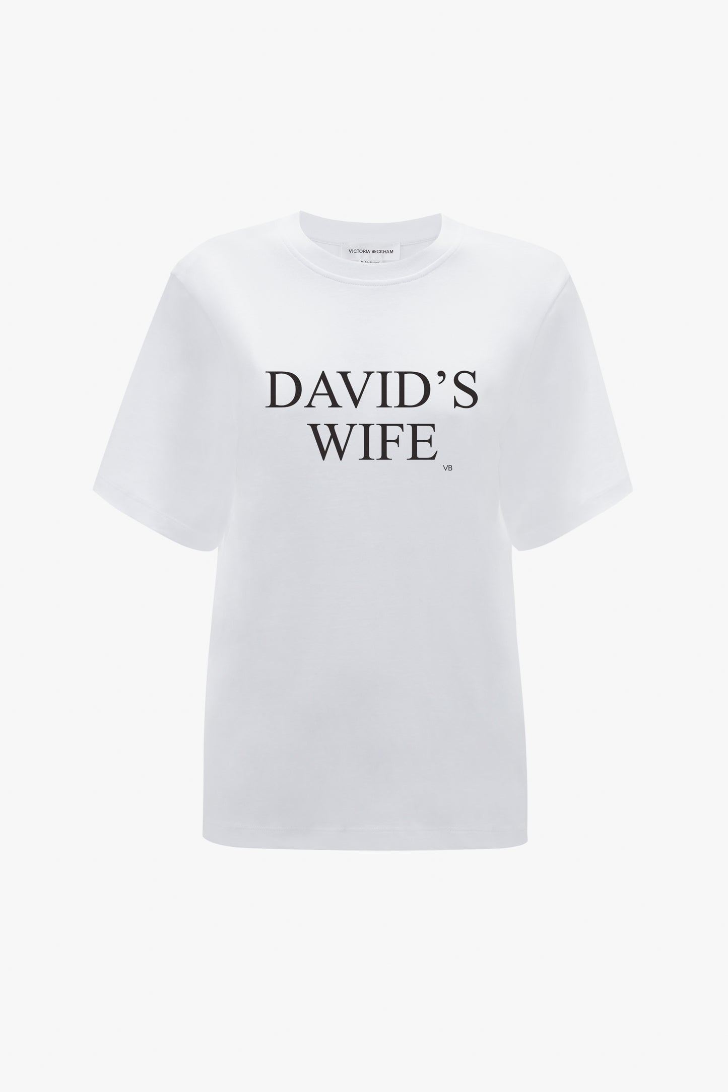Victoria Beckham's 'David's Wife' Slogan T-Shirt in White, made of organic cotton and featuring the phrase printed in black letters on the front, displayed on a plain background.