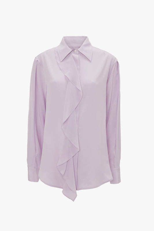 A light purple silk Asymmetric Ruffle Blouse In Petunia by Victoria Beckham, with a ruffled front and a classic collar, displayed on a white background.
