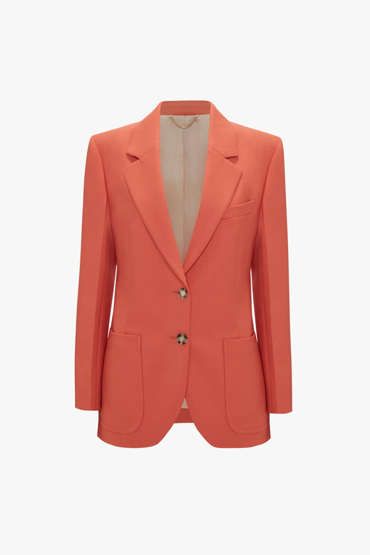 A Victoria Beckham patch pocket jacket in papaya with a single button closure and two front pockets, displayed on a plain white background.