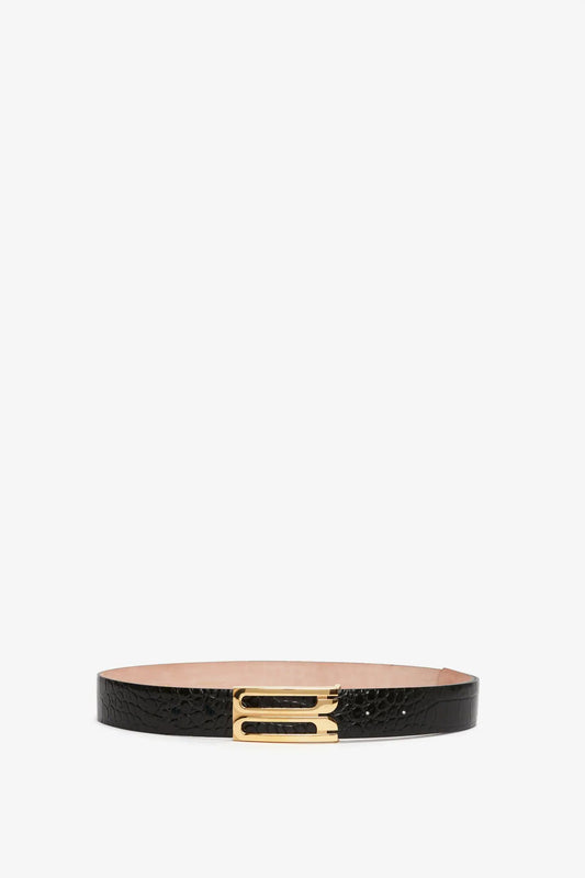 Jumbo Frame Belt In Black Croc-Effect Leather from Victoria Beckham, with a gold buckle, centered on a white background.