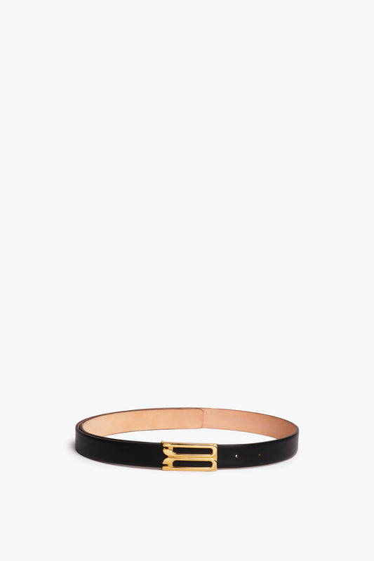 A Victoria Beckham black leather Frame Buckle Belt, positioned horizontally on a white background.