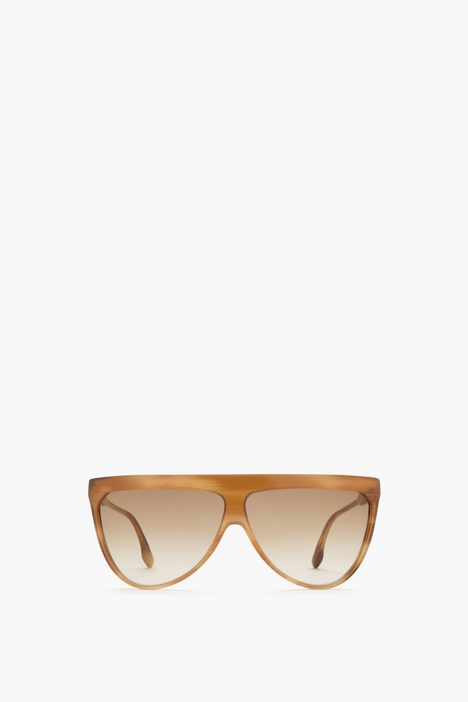 A pair of iconic Victoria Beckham Classic Flat Top V Sunglasses in Honey Horn with gradient brown lenses, crafted from luxurious horn-effect acetate and offering 100% UV protection, displayed against a plain white background.