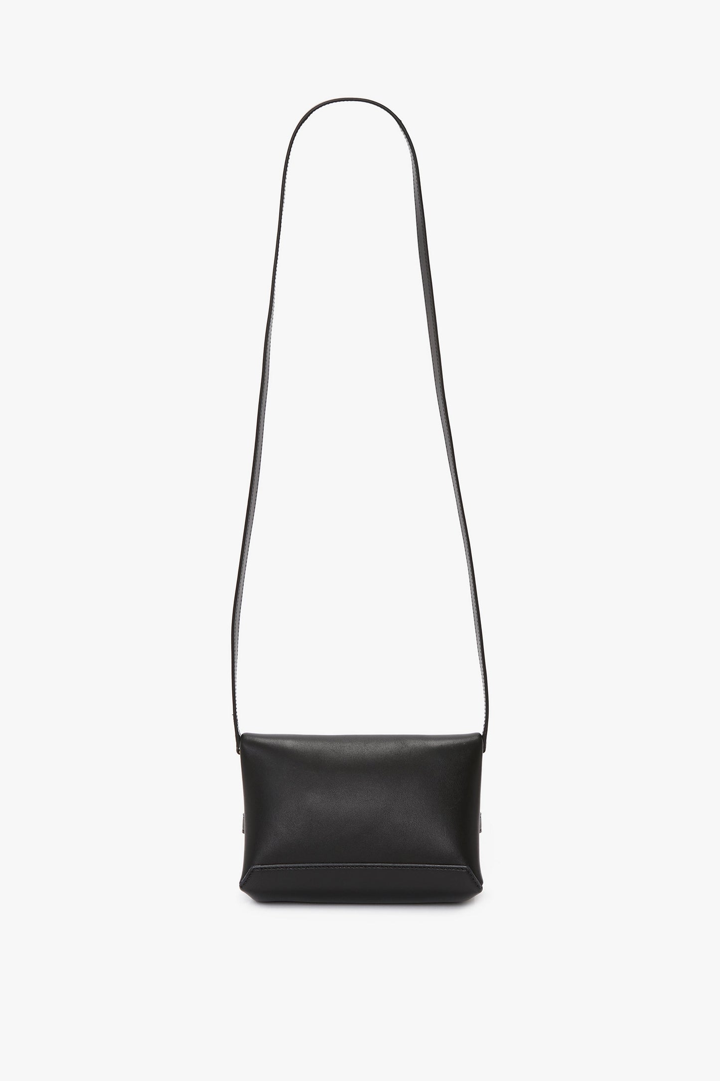 A black lambskin leather rectangular shoulder bag with a long strap against a plain white background, reminiscent of a Mini Chain Pouch Bag With Long Strap In Black Leather by Victoria Beckham.