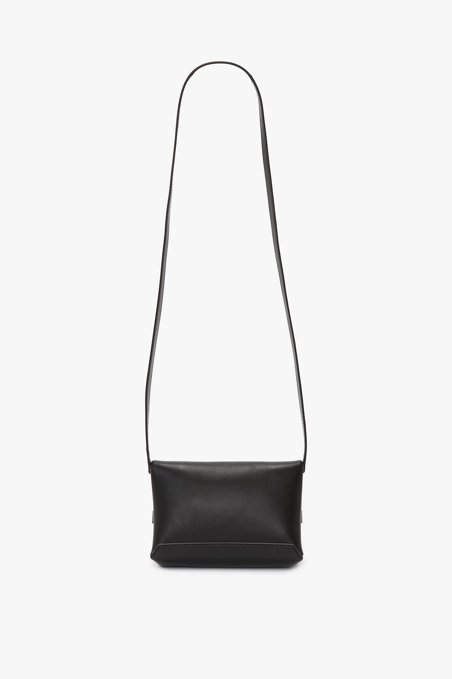 A black lambskin leather rectangular shoulder bag with a long strap against a plain white background, reminiscent of a Mini Chain Pouch Bag With Long Strap In Black Leather by Victoria Beckham.