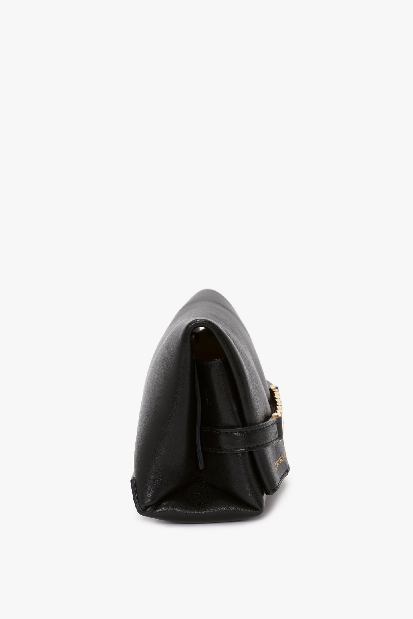 Side view of a Mini Chain Pouch Bag With Long Strap In Black Leather by Victoria Beckham.