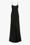 A black, sleeveless, Floor-Length Cami Dress In Black by Victoria Beckham with thin spaghetti straps and a smooth, flowing crepe back satin texture.