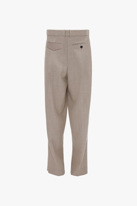 Back view of Victoria Beckham Reverse Front Trouser In Sesame with a buttoned pocket on the right side and belt loops at the waistband, perfect for the modern woman seeking a contemporary silhouette.