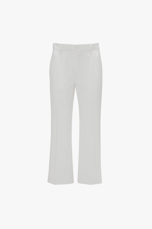 Exclusive Cropped Tuxedo Trouser In Ivory by Victoria Beckham with a high waist, straight legs, belt loops, and two side pockets, displayed on a white background.