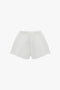 Drawstring Embroidered Mini Short In Antique White by Victoria Beckham with an elastic waistband and drawstring tie, featuring a vintage appeal, displayed on a plain white background.