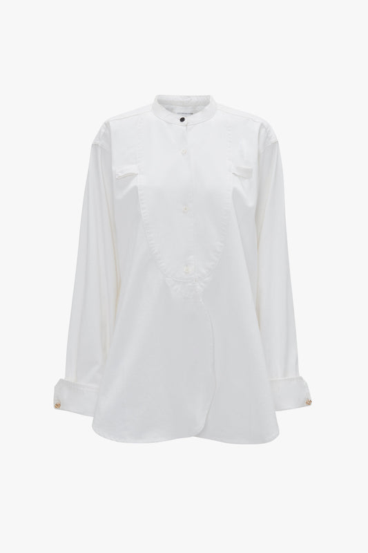Bib-Front Tuxedo Shirt In Washed White by Victoria Beckham with a relaxed fit, featuring a mandarin collar and curved front seams.