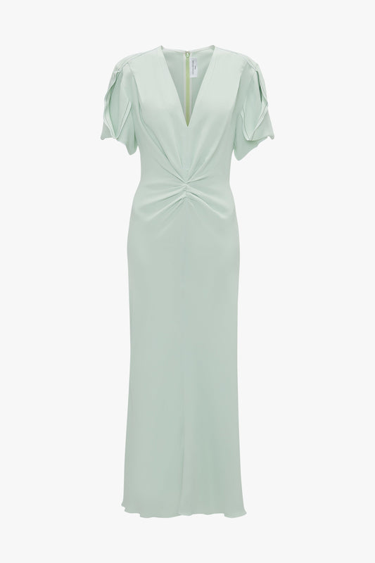 Gathered V-neck midi dress in jade with short flutter sleeves and a twisted front detail, displayed against a white background by Victoria Beckham.