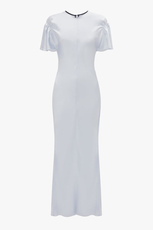 A long, fitted Gathered Sleeve Midi Dress In Ice by Victoria Beckham features a graceful godet insert for added flair.
