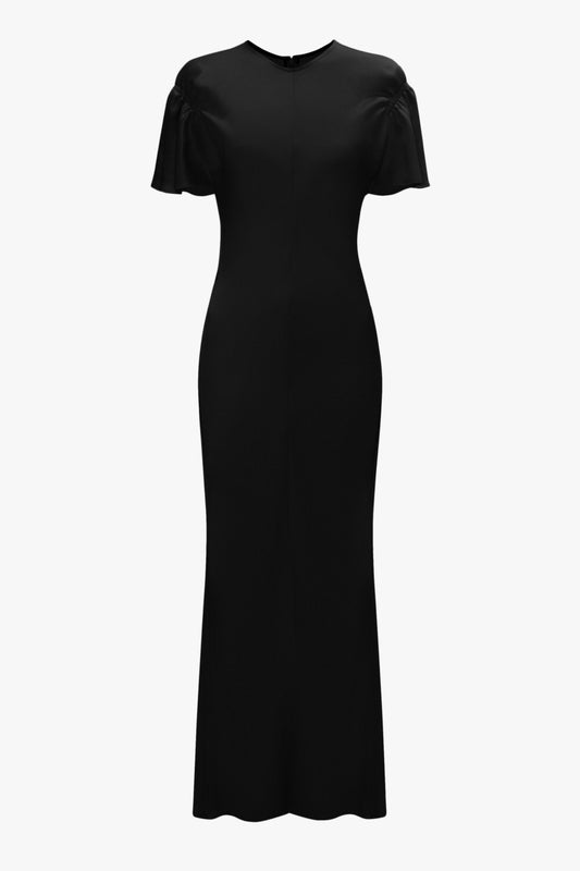 A Gathered Sleeve Midi Dress In Black by Victoria Beckham. The dress features a high neckline and a back zipper closure.