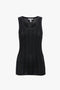 A Victoria Beckham Fine Knit Vertical Stripe Tank In Black-Blue: a black, sleeveless ribbed knit tank top with vertical stitching details, displayed against a white background.