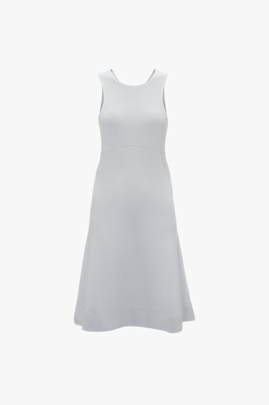 A Victoria Beckham Sleeveless Tank Dress In Ice with a fitted bodice and an A-line skirt that flares beautifully.
