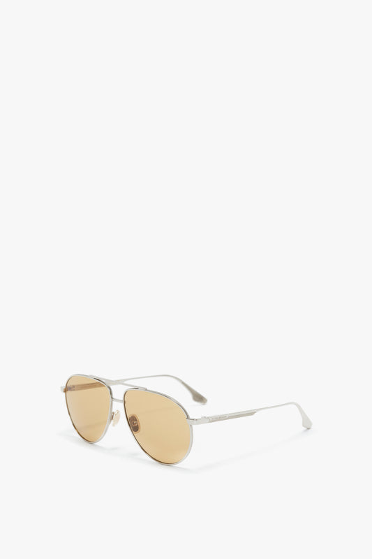 A pair of Victoria Beckham V Metal Pilot Sunglasses In Silver-Brown, isolated on a white background.