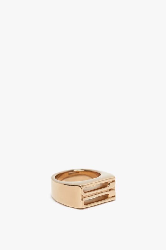 Exclusive Frame Signet Ring In Gold by Victoria Beckham displayed on a white background.