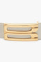 Close-up of a gold metal buckle with a modern geometric design on a contemporary beige calf leather belt, the Jumbo Frame Belt In Latte Leather by Victoria Beckham.