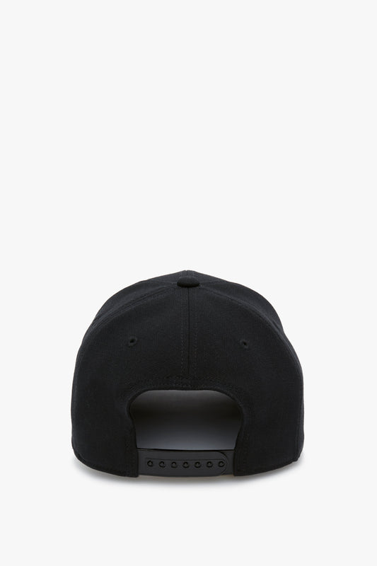 Back view of a black Exclusive Logo Cap In Black from Victoria Beckham isolated on a white background, showing the adjustable strap and structured design.