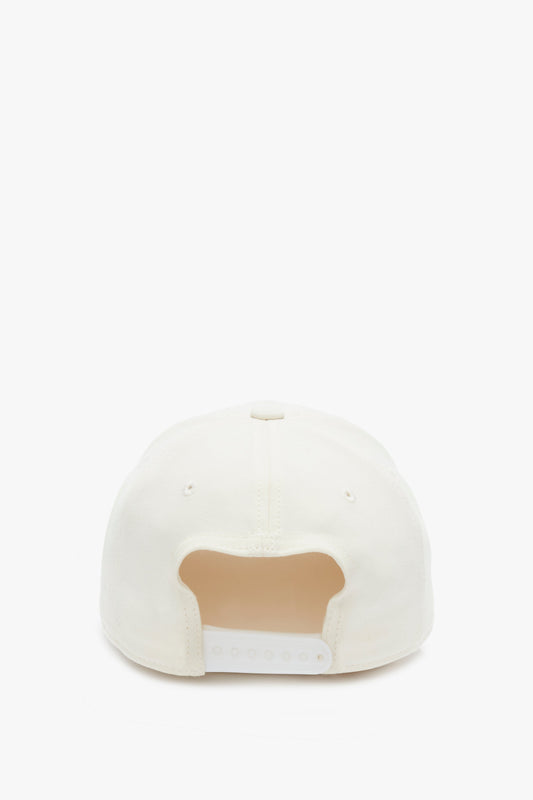 Back view of a Victoria Beckham Logo Cap In Antique White adjustable snap baseball cap against a white background.