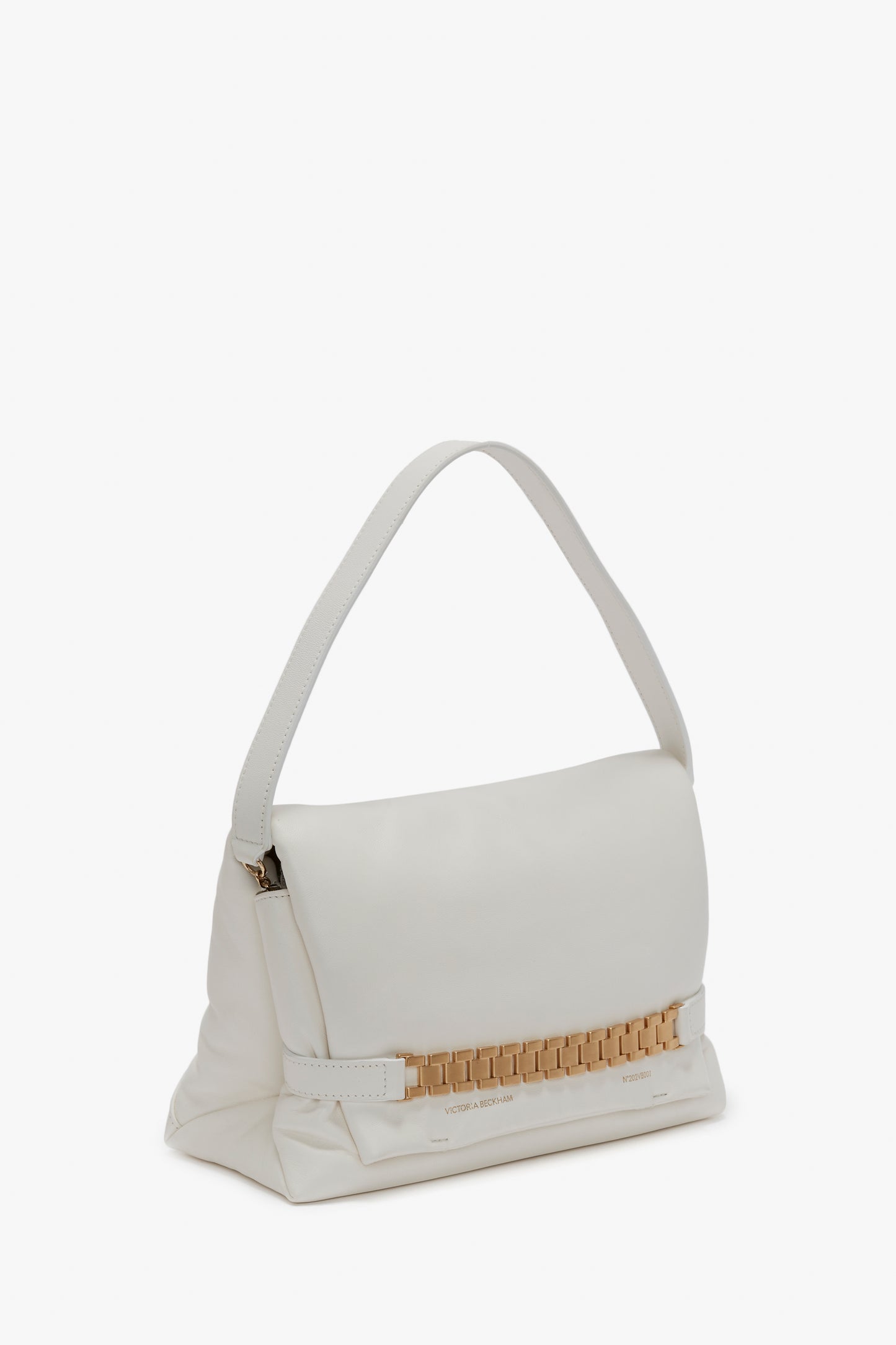 A Victoria Beckham Puffy Chain Pouch Bag With Strap In White Leather. Features a gold chain detail at the bottom of the flap, adding a touch of elegance.