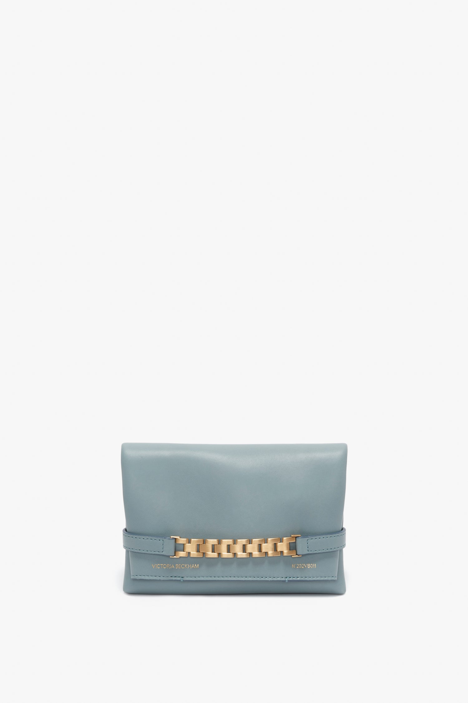 A soft-blue leather Mini Chain Pouch Bag With Long Strap In Ice Leather with a gold-tone chain detail and "Victoria Beckham" embossed on the front.