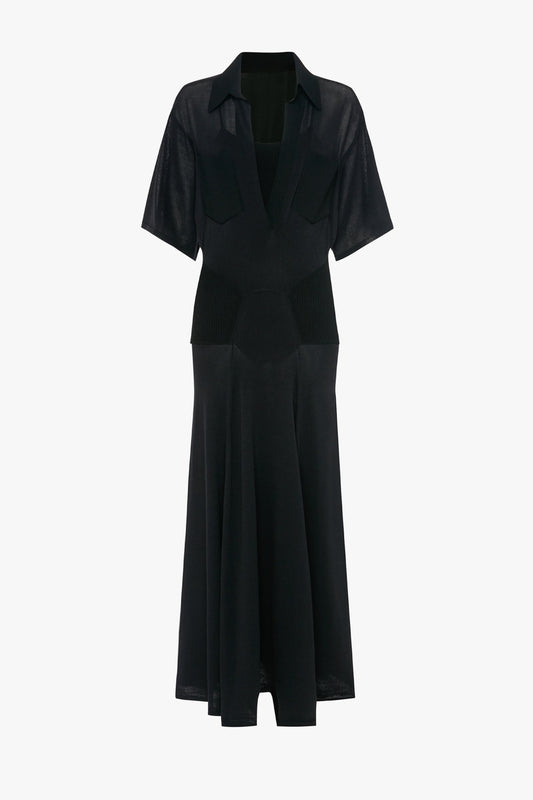 A Panelled Knit Dress In Black by Victoria Beckham, with short sleeves, a collared neckline, chest pockets, a fitted waist, and a flared skirt.