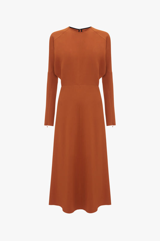 A Victoria Beckham Dolman Midi Dress in Russet with a fitted waist and flared skirt, displayed on a plain white background.