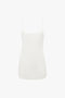 An Exclusive Cami Top In Ivory by Victoria Beckham, crafted from 100% silk, featuring thin shoulder straps for a delicate touch.