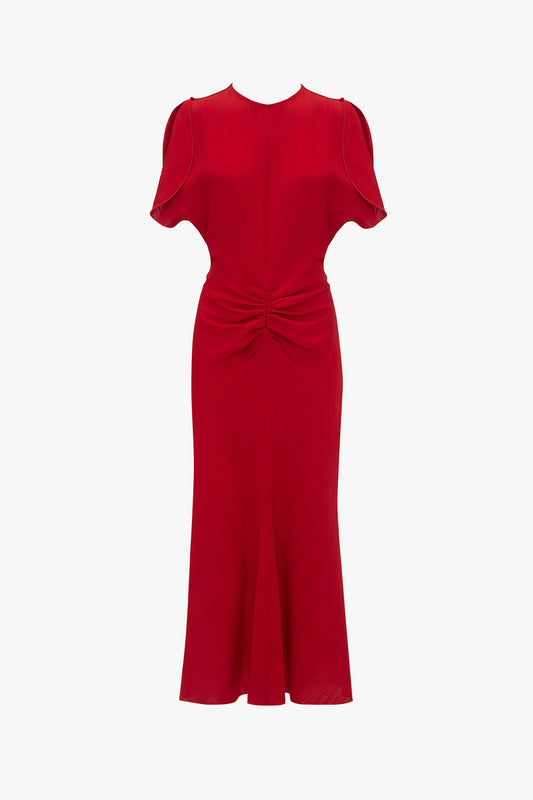 Exclusive Gathered V-Neck Midi Dress In Carmine by Victoria Beckham with short sleeves, a round neckline, and a twisted knot detail at the gathered waist, displayed on a white background.