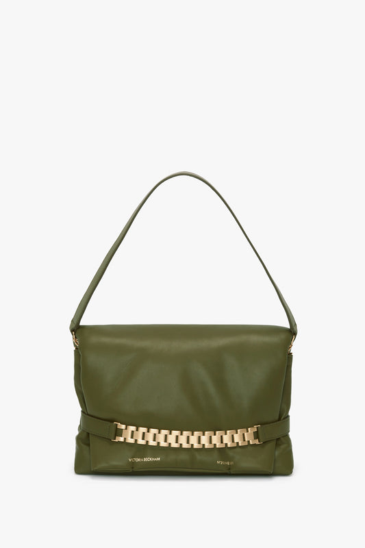 The olive green VB handbag features a single strap and a stylish gold chain detail, reflecting the sophisticated design of a Puffy Chain Pouch With Strap In Khaki Leather by Victoria Beckham.