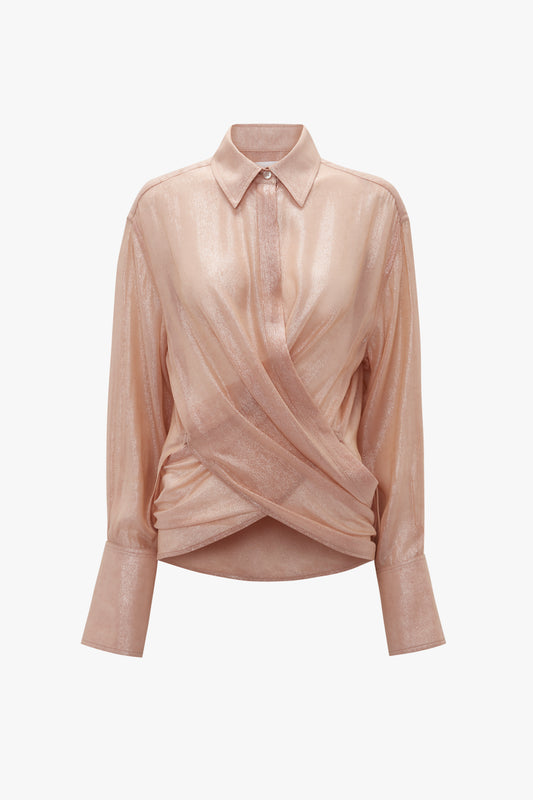 A long-sleeved, metallic pink Wrap Front Blouse In Rosewater by Victoria Beckham in a rosewater shade with a collar and gathered, draped front design.