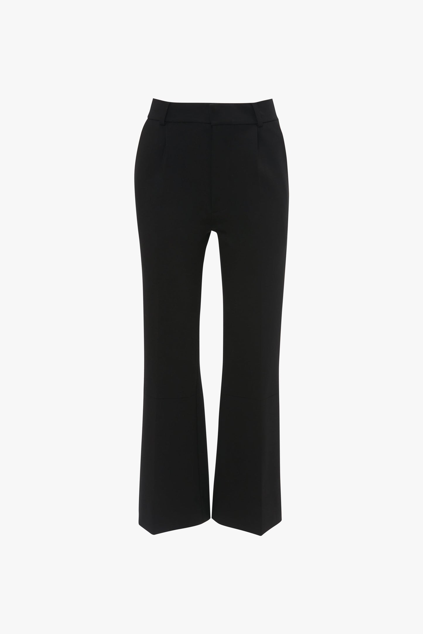 A pair of Cropped Kick Trousers In Black by Victoria Beckham, exemplifying a minimalist aesthetic, shown against a white background.