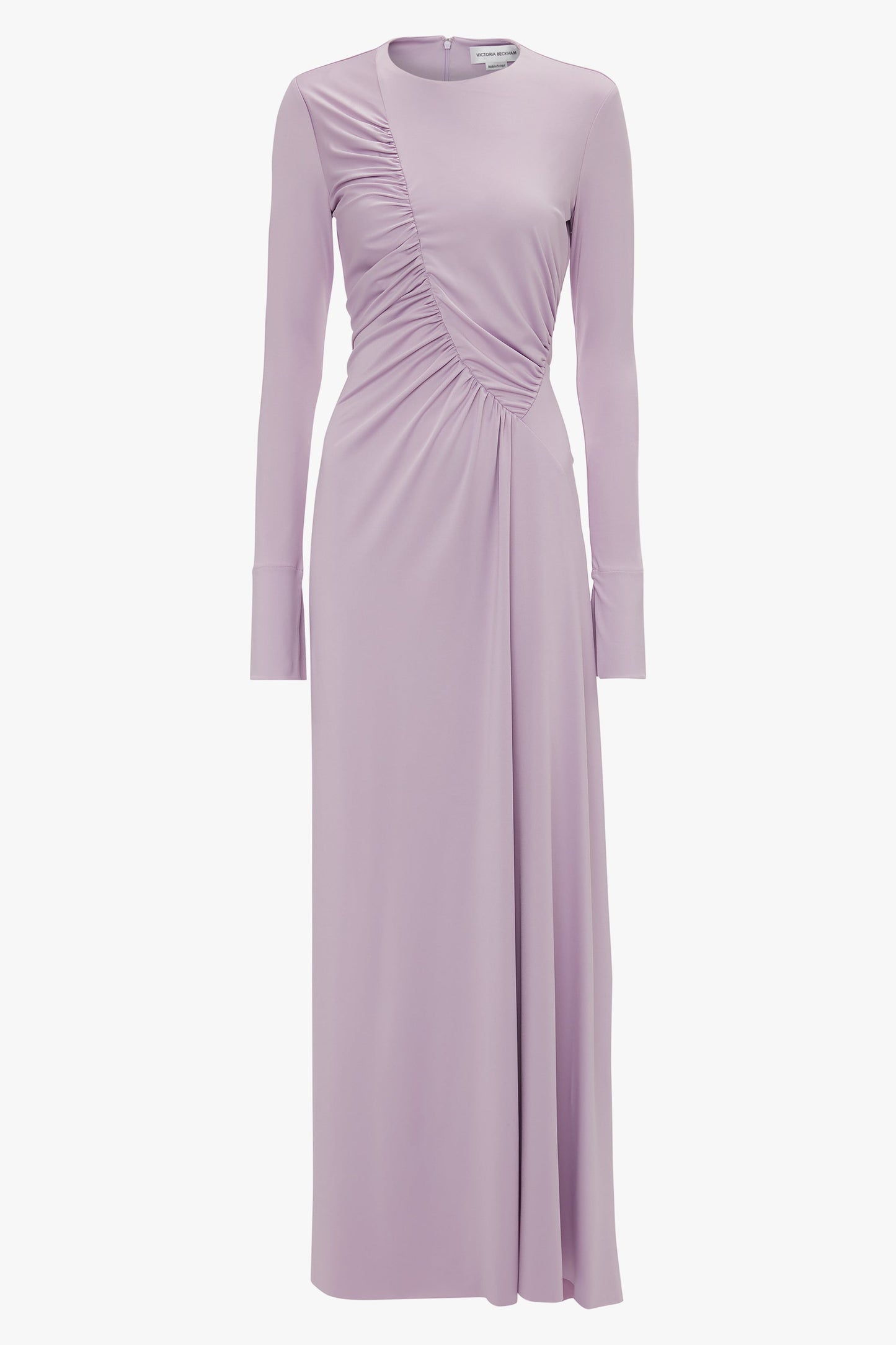A long-sleeved, lavender Ruched Detail Floor-Length Gown In Petunia by Victoria Beckham crafted from stretch jersey, featuring asymmetrical ruching across the bodice and a slit at the hem for an understated glamour.