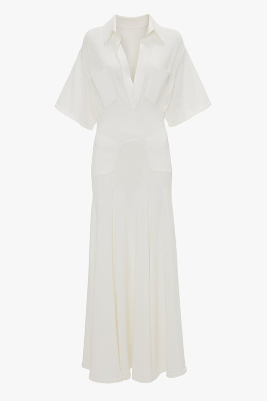 Elegant Panelled Knit Dress In White by Victoria Beckham with short sleeves, collared neckline, two chest pockets, and a flared skirt.