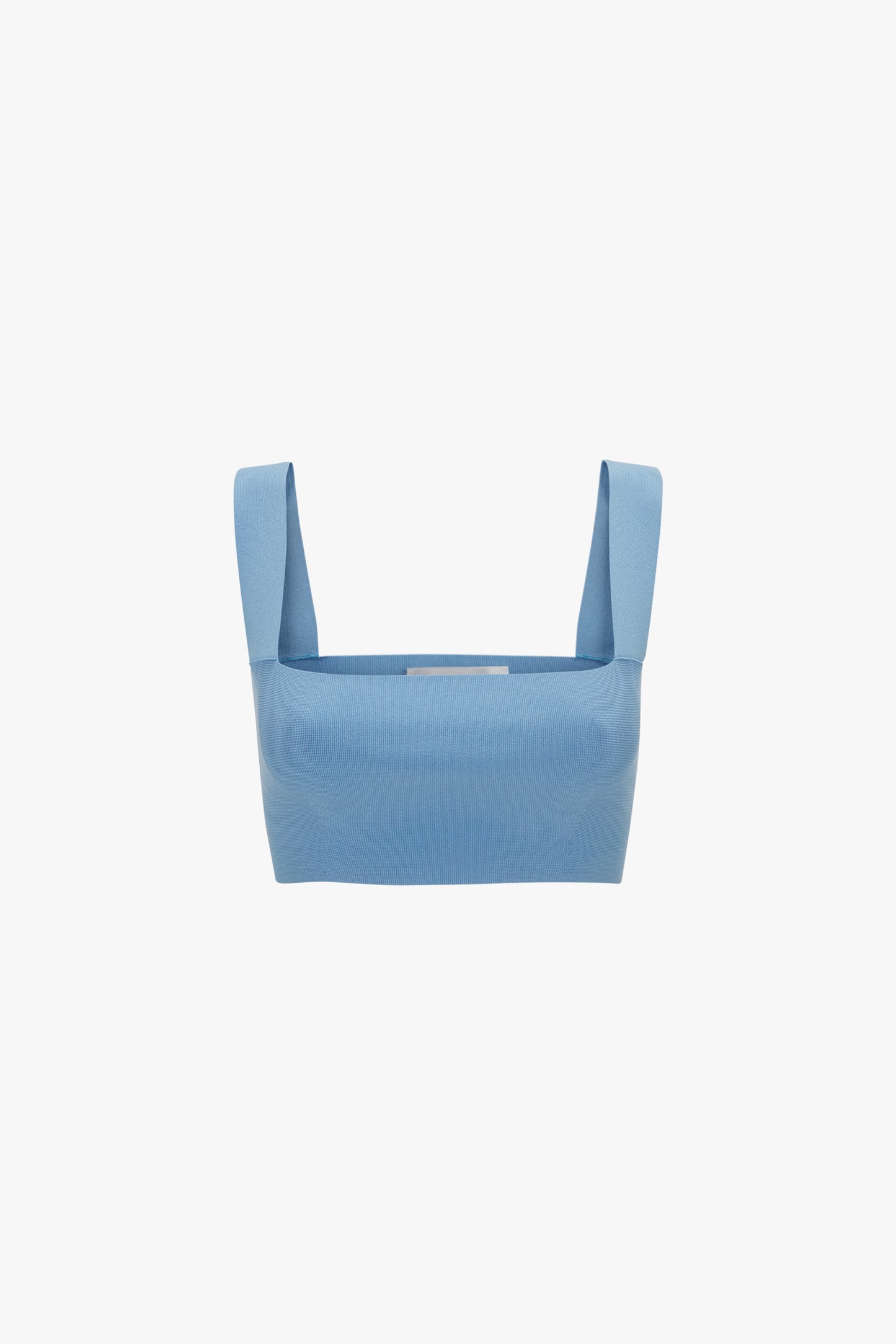 A light blue ultra form-fitting Strap Bandeau Top In Marina with wide shoulder straps, displayed against a plain white background from Victoria Beckham.