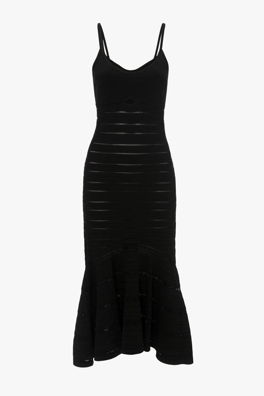 A black, sleeveless, body-sculpting dress with thin straps and a flared bottom, crafted from luxurious stretch knit fabric: the Cut-Out Detail Cami Dress In Black by Victoria Beckham.