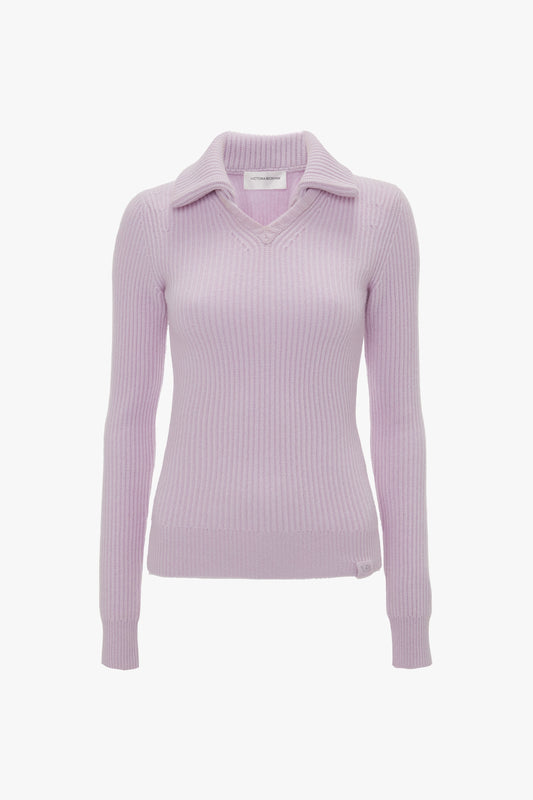 A Double Collared Jumper In Petunia by Victoria Beckham, with a V-neck and a wide collar, featuring a classic fisherman’s ribbed knit, displayed on a white background.