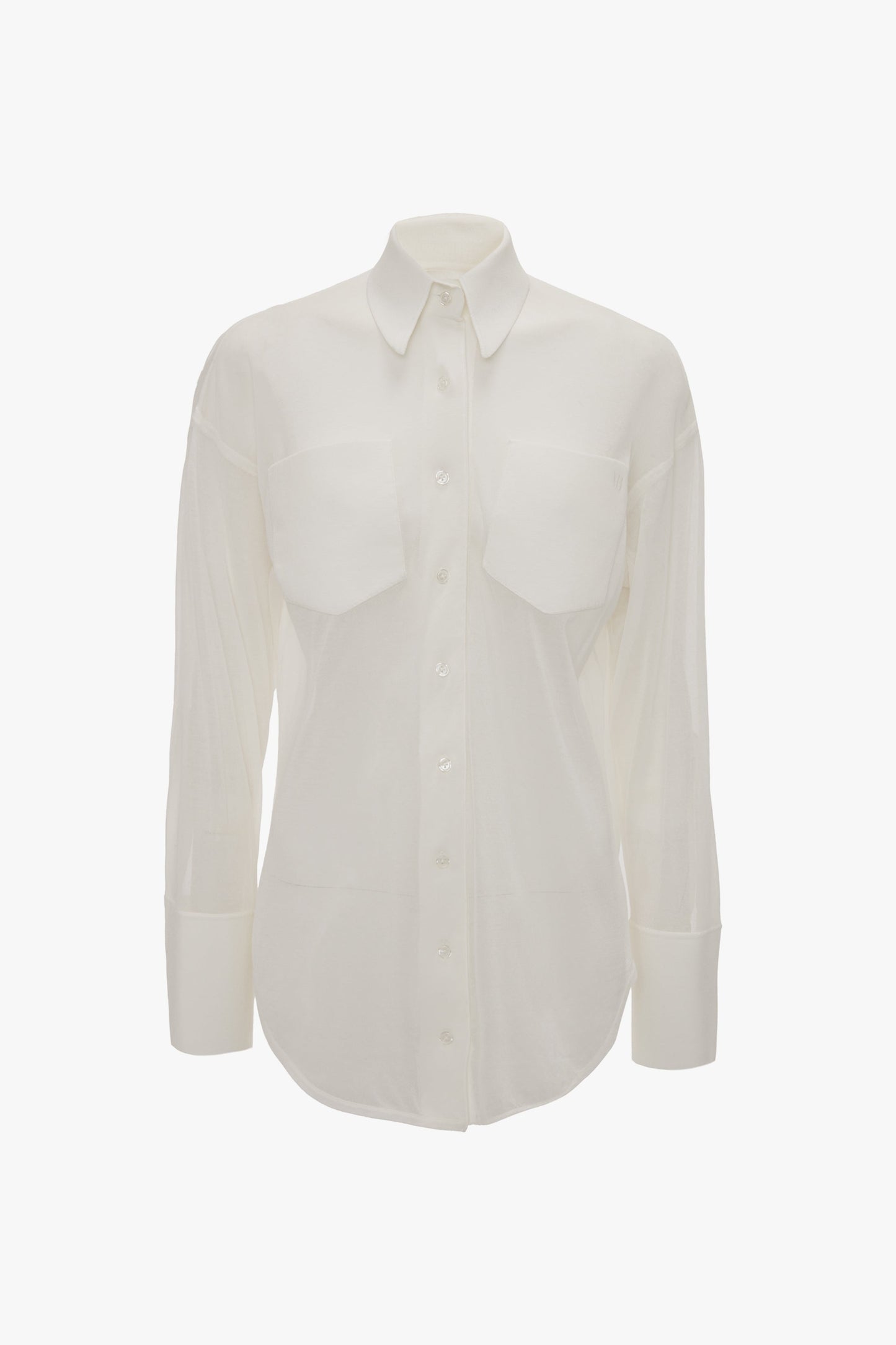 A casual sophistication radiates from this Pocket Detail Shirt In White by Victoria Beckham, featuring pocket detail with two chest pockets and a traditional collar, displayed against a plain background.