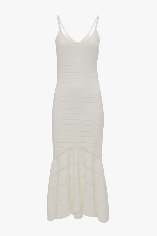 A Cut-Out Detail Cami Dress In White by Victoria Beckham features a fitted bodice, flared silhouette, and chic cut-out details.