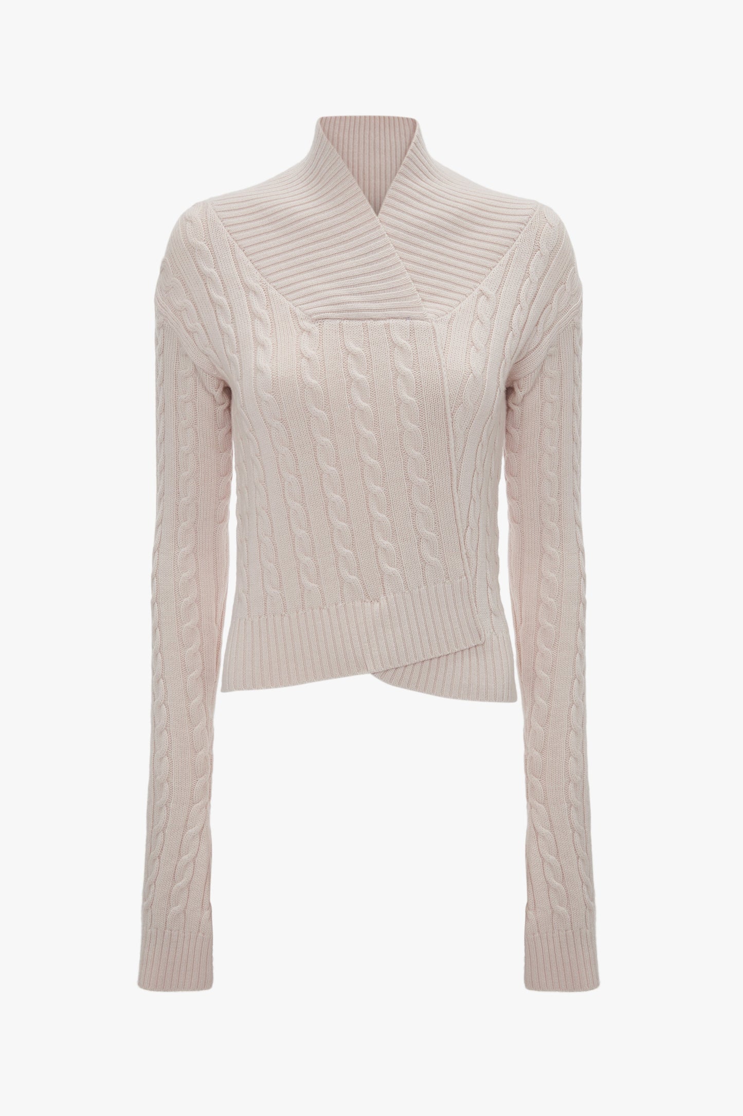A Wrap Detail Jumper In Bone by Victoria Beckham, crafted from cabled merino wool, featuring a high neckline and an asymmetrical design crossing at the waist for a fitted wrap-style silhouette.