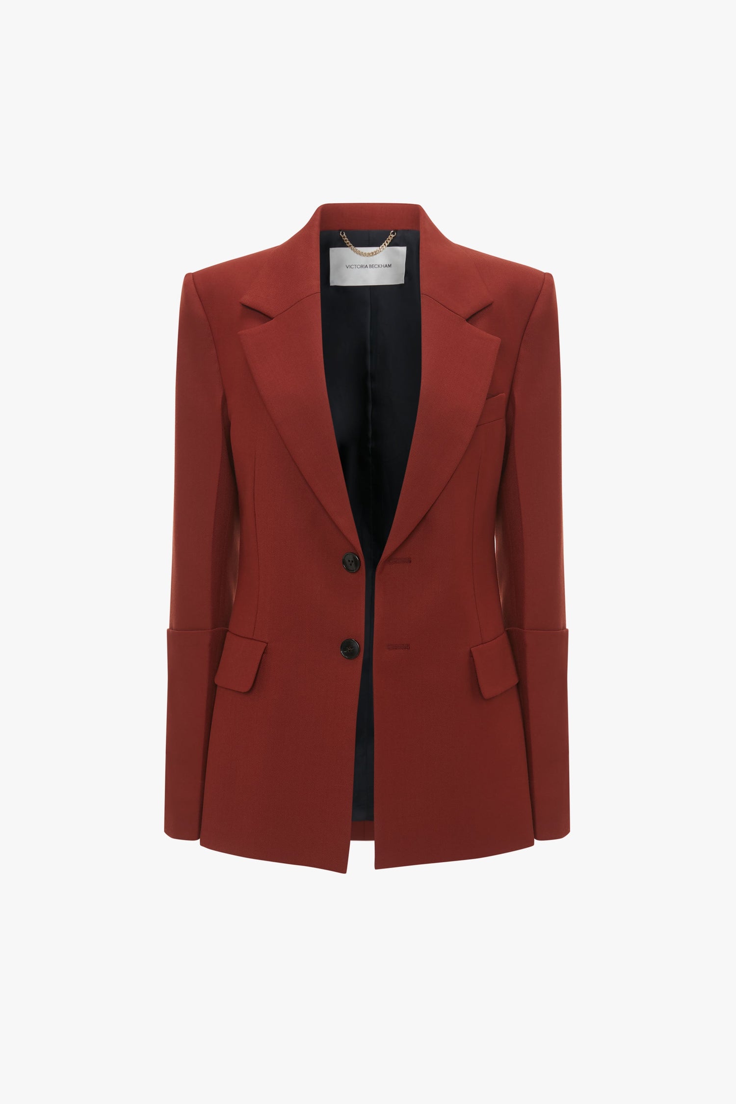 A single-breasted, tailored Victoria Beckham Sleeve Detail Patch Pocket Jacket In Russet crafted from recycled wool, featuring contemporary detailing with a notch lapel, two front pockets with flaps, and buttoned cuffs.