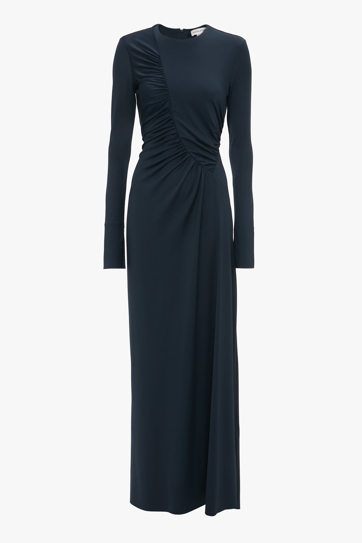 A long-sleeve, floor-length navy blue Ruched Detail Floor-Length Gown In Midnight by Victoria Beckham features gathered ruching on the front and a high neckline, perfect for evening occasions.