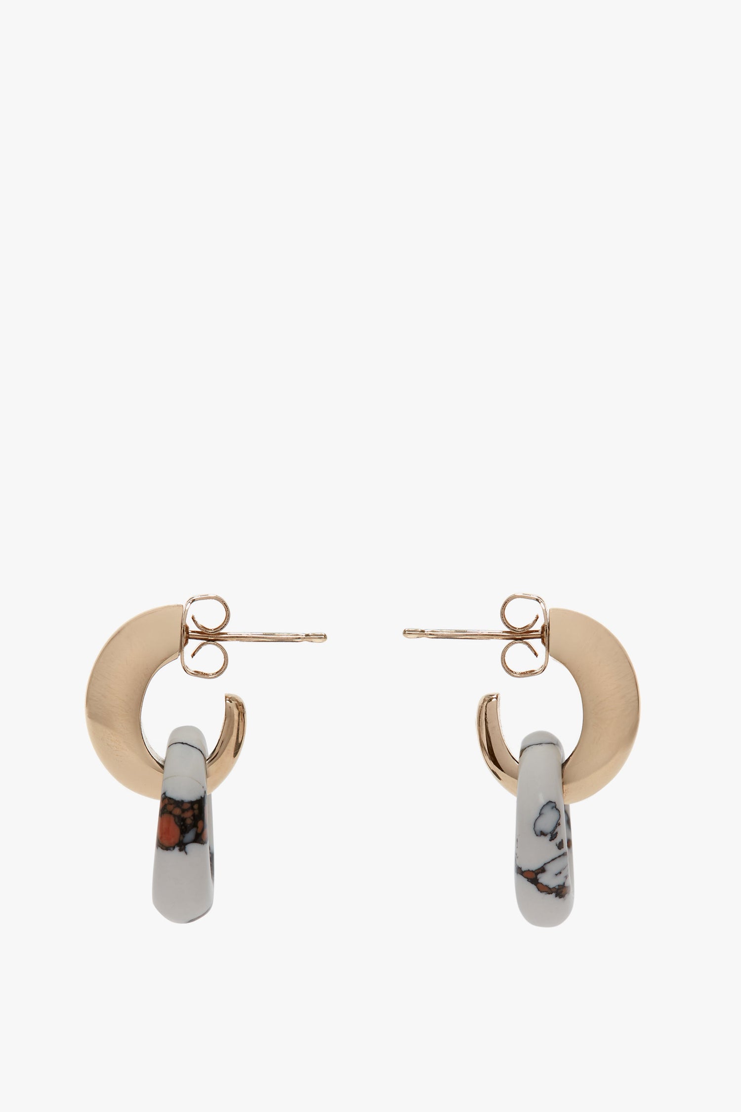 A pair of Exclusive Resin Pendant Earrings In Light Gold-White by Victoria Beckham, crafted in Italy from antiallergic stainless-steel with post back closures, displayed against a white background.