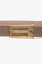 Close-up of a Victoria Beckham Exclusive Micro Frame Belt In Beige Leather, featuring gold-colored double-bar hardware.