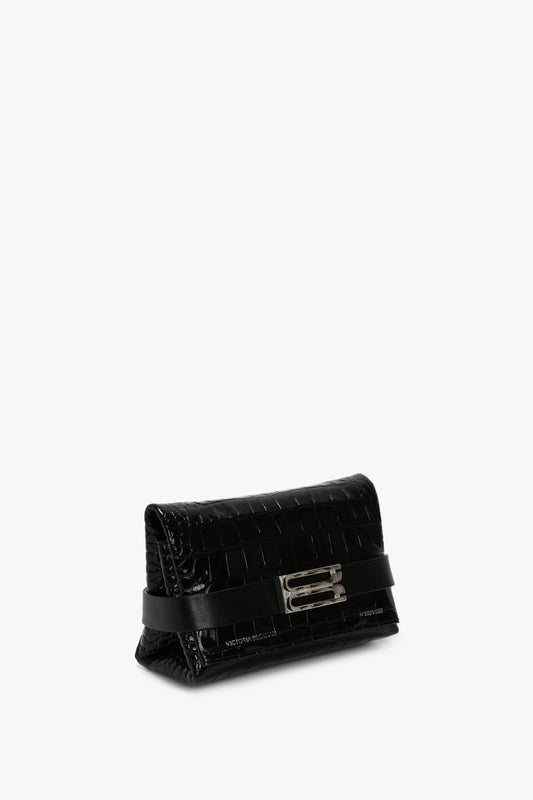 A Mini B Pouch In Croc Effect Black Leather by Victoria Beckham, featuring a rectangular metallic clasp and a sleek design.